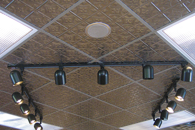Metal accoustic ceiling tiles installed in a jewelry store