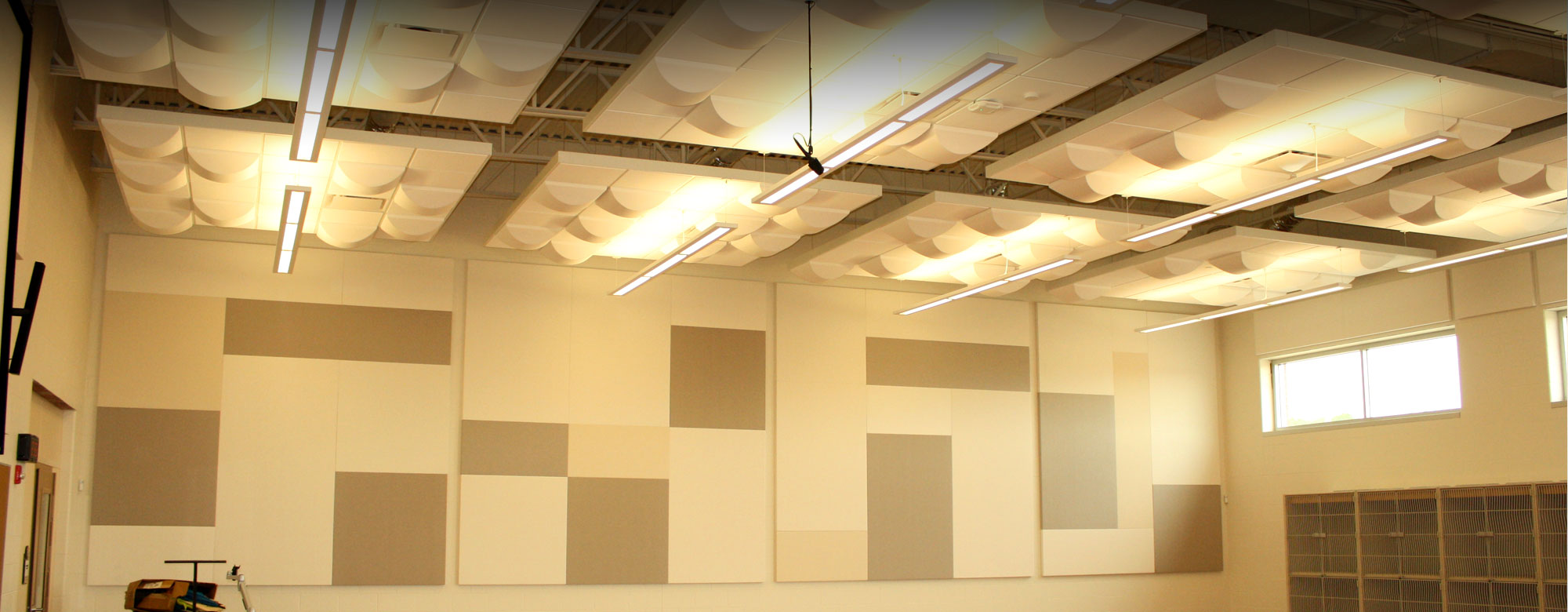 Modern accoustical ceiling panels and wall sound proofing panels in the choir room of a school
